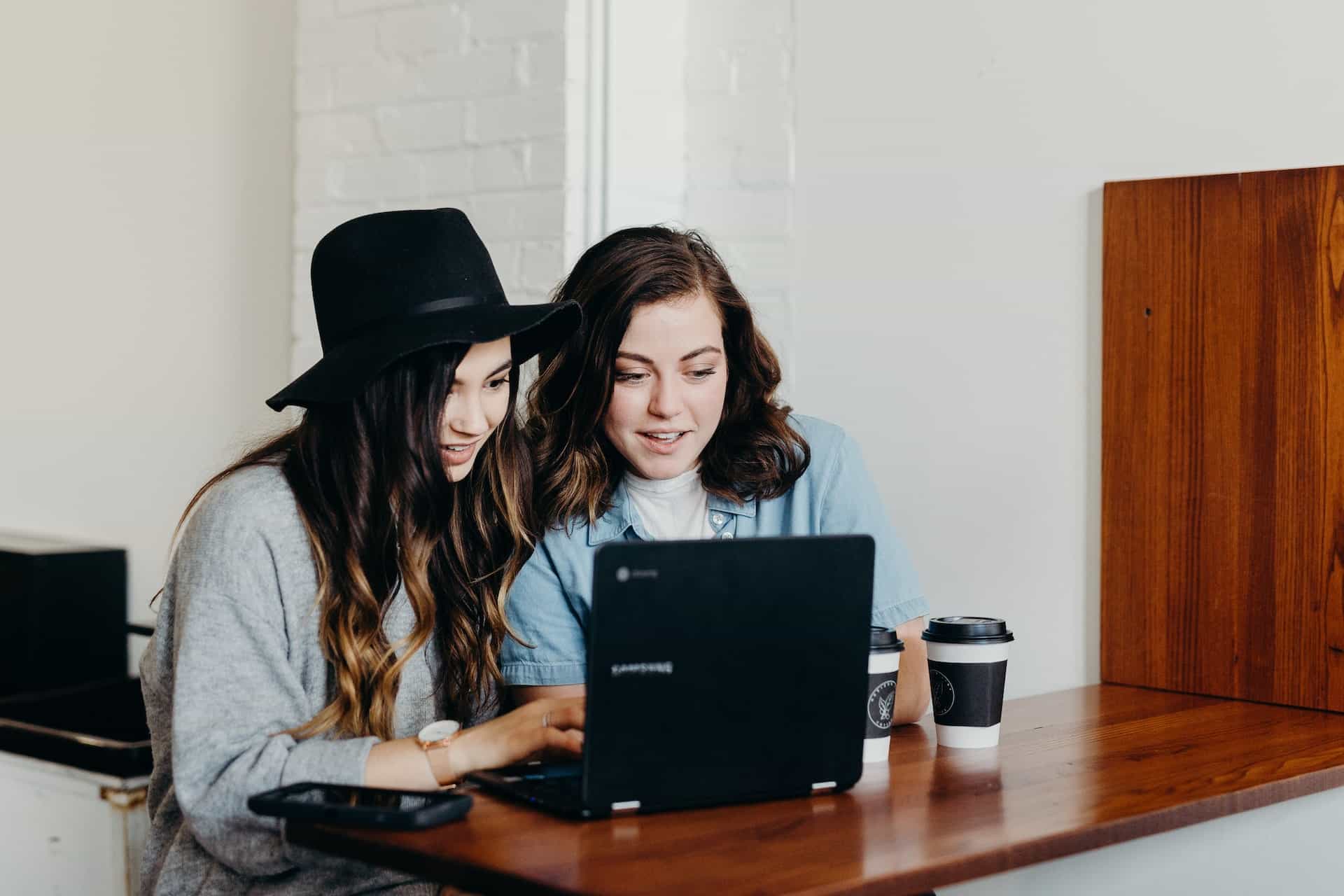 Two girls working on laptop | jobs for 15 year olds