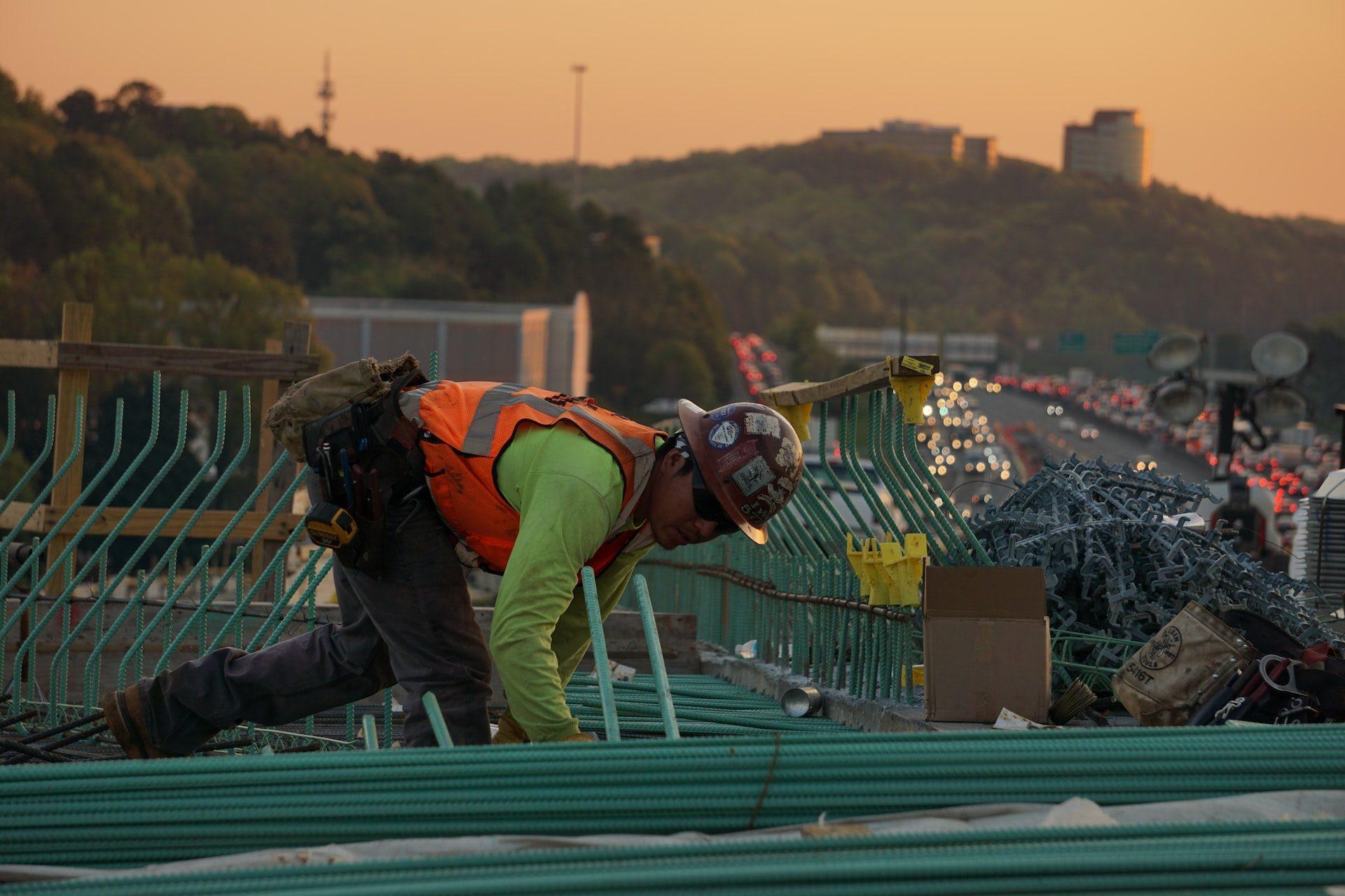 Person working on pipes | Best Paying Jobs in Electric Utilities