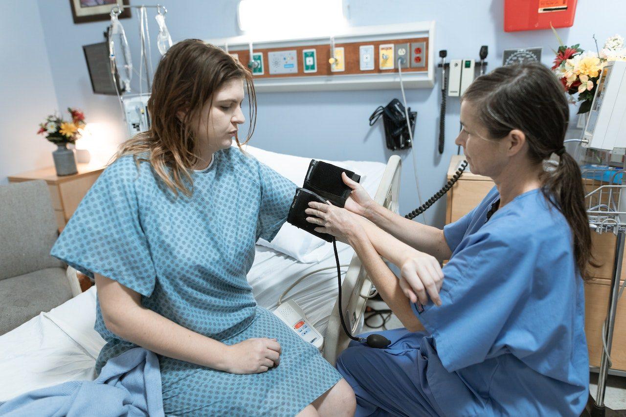 Nurse helping a patient