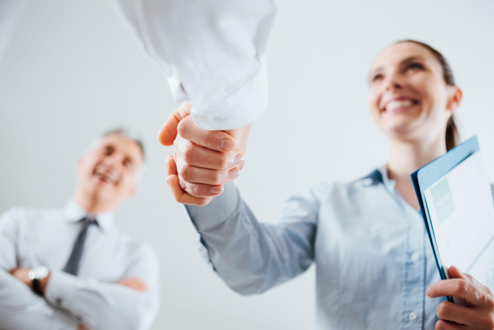 Woman shaking hands