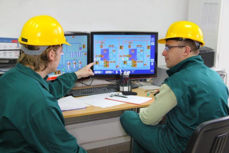 workers in control room